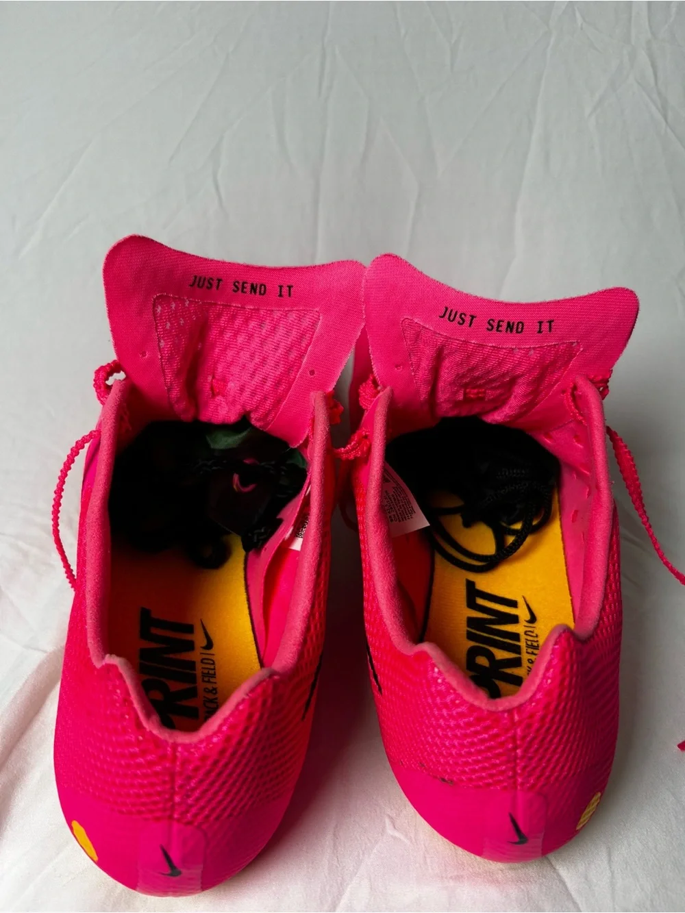Nike Bright Pink Athletic track with Black Swoosh men’s 10/1/2